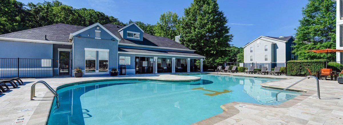 A Logen Capital apartment community with pool and clubhouse